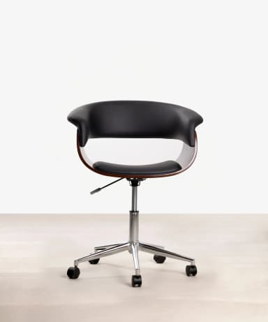 A close-up view of a lounge chair, highlighting its curved bentwood frame in a rich brown finish and contrasting black upholstered seat and backrest. The black upholstery features a subtle pebbled texture and visible stitching, suggesting leather or a high-quality faux leather. The wooden frame exhibits a distinct grain pattern, indicating a molded plywood or bentwood construction that creates a sleek, continuous curve. The design suggests a modern or mid-century aesthetic. — 3D model