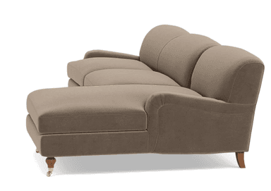A modern sectional sofa with a chaise extension, upholstered in a light taupe fabric and featuring wooden legs, one with a brass caster. — 3D model