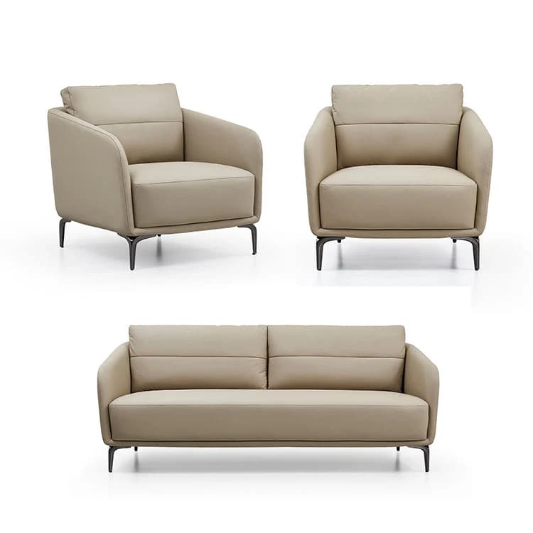 A three-piece modern sofa set consisting of two armchairs and one sofa. The pieces are upholstered in a smooth, light beige material and feature clean lines, padded cushions, and subtle horizontal stitching on the backrests. They are supported by slender, dark metal legs with a slightly angled profile. — 3D model
