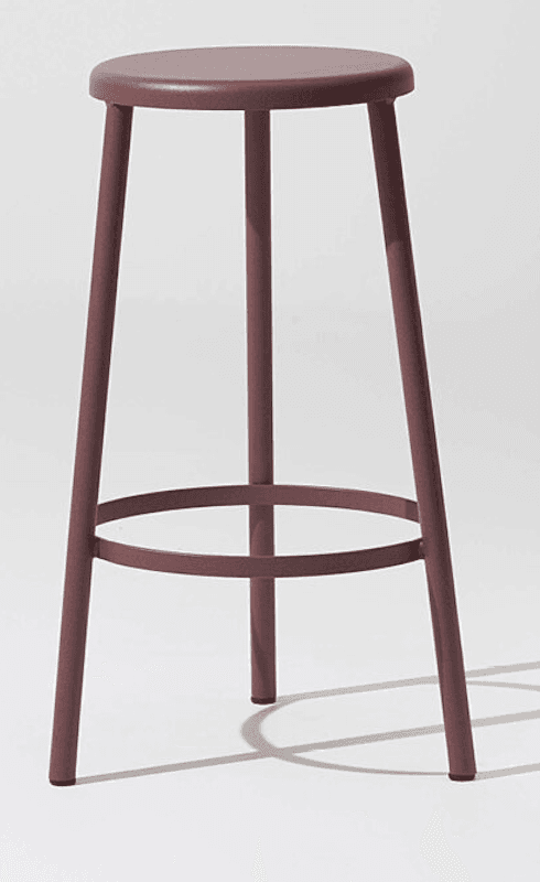 A minimalist bar stool with a round, flat seat and three slender legs. A circular footrest connects the legs at a lower height. The stool has a matte finish. — 3D model