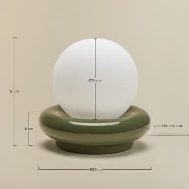 A modern table lamp featuring a spherical frosted white glass diffuser resting within a polished chrome base with a rounded, toroidal shape. The minimalist design emphasizes geometric forms and a sleek, reflective finish on the base, providing ambient light through the globe. — 3D model