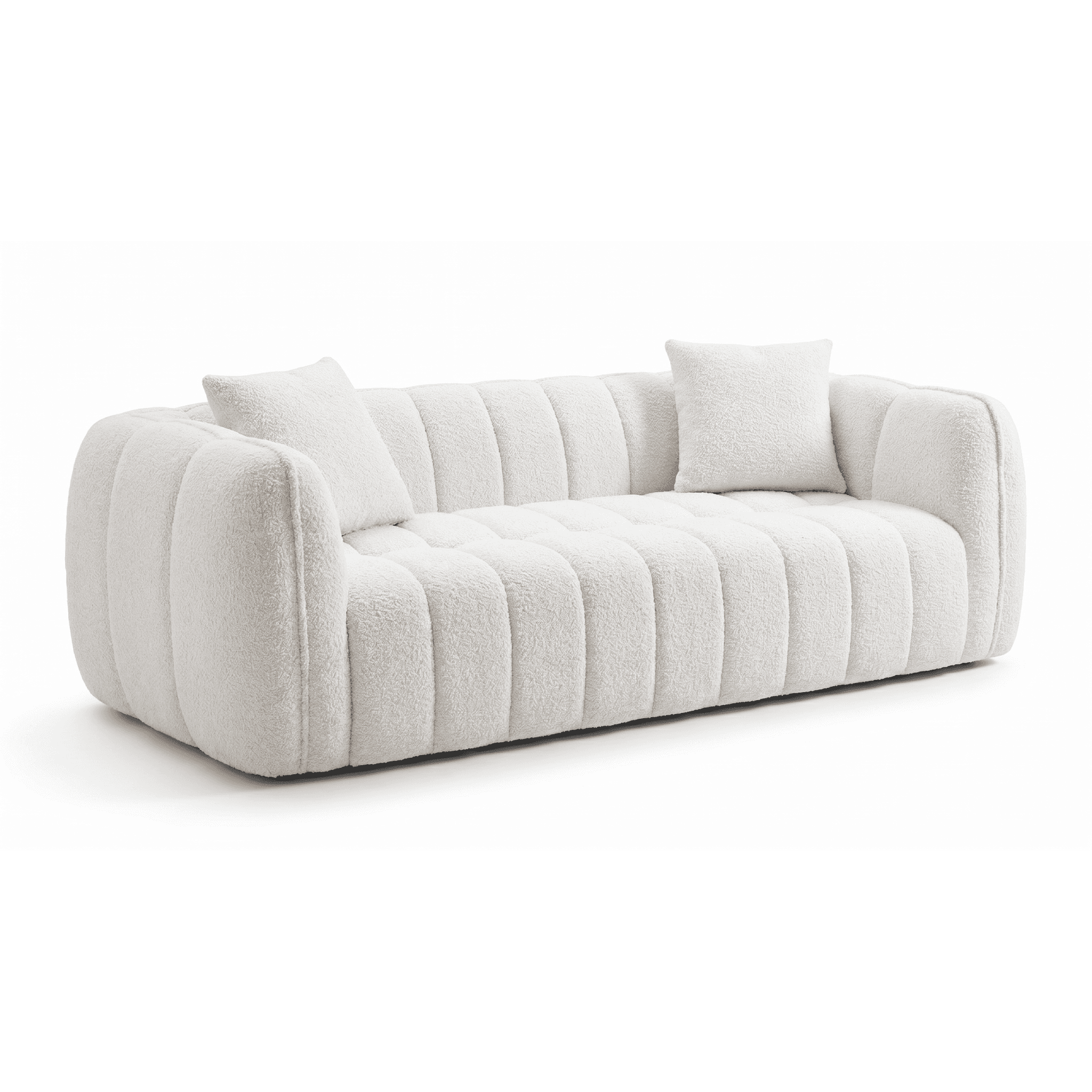 A contemporary sofa upholstered in a plush, off-white boucle fabric, featuring distinctive vertical channel tufting across the seat, back, and arms. The design has rounded, substantial forms, and includes two matching throw pillows. — 3D model