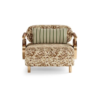 A contemporary lounge chair featuring a low-profile design, upholstered in a textured fabric with an abstract, organic pattern in shades of beige and brown. It includes distinctive polished brass armrest structures, partially wrapped in tan leather, and a unique circular side tray with a leather insert, also suspended by brass. The chair is supported by slender, tapered brass legs. — 3D model