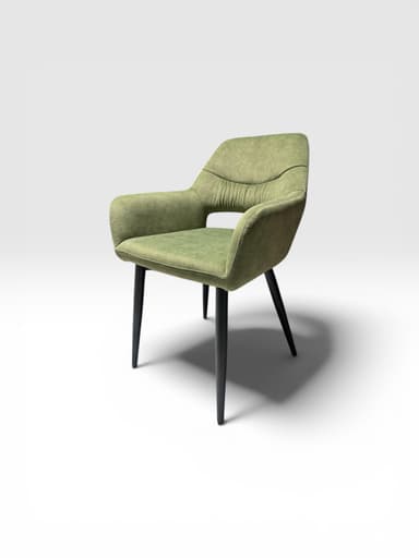 A contemporary dining chair upholstered in a textured sage green fabric, featuring integrated armrests and a gently curved back with subtle pleating. It stands on four splayed, dark-finished legs. — 3D model