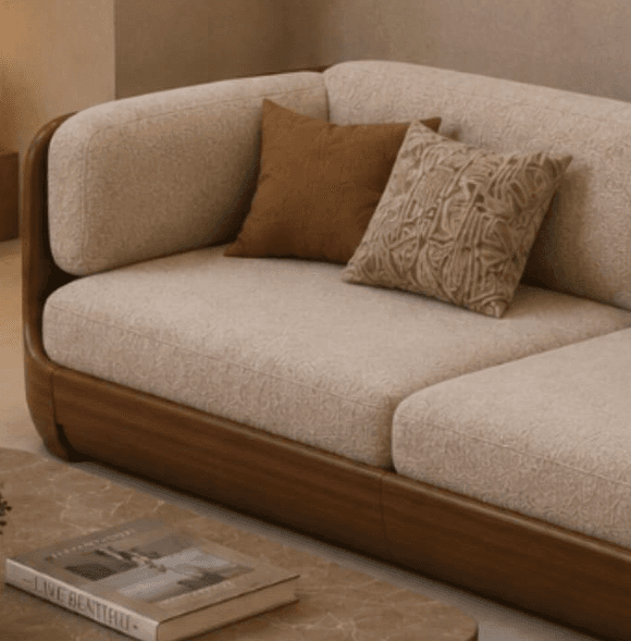 A modern two-seater sectional sofa with an integrated chaise lounge, featuring a continuous wraparound dark wood frame and light beige fabric upholstery. — 3D model