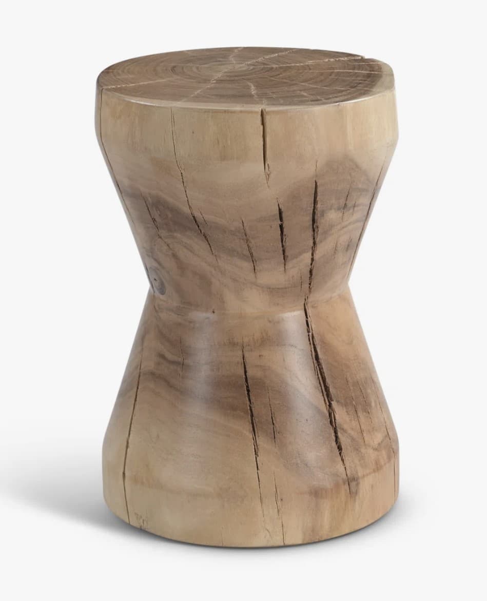A natural solid wood stool carved from a single piece of timber, featuring a distinct hourglass or spool-like silhouette. The light brown surface displays prominent wood grain and natural checks/fissures. — 3D model