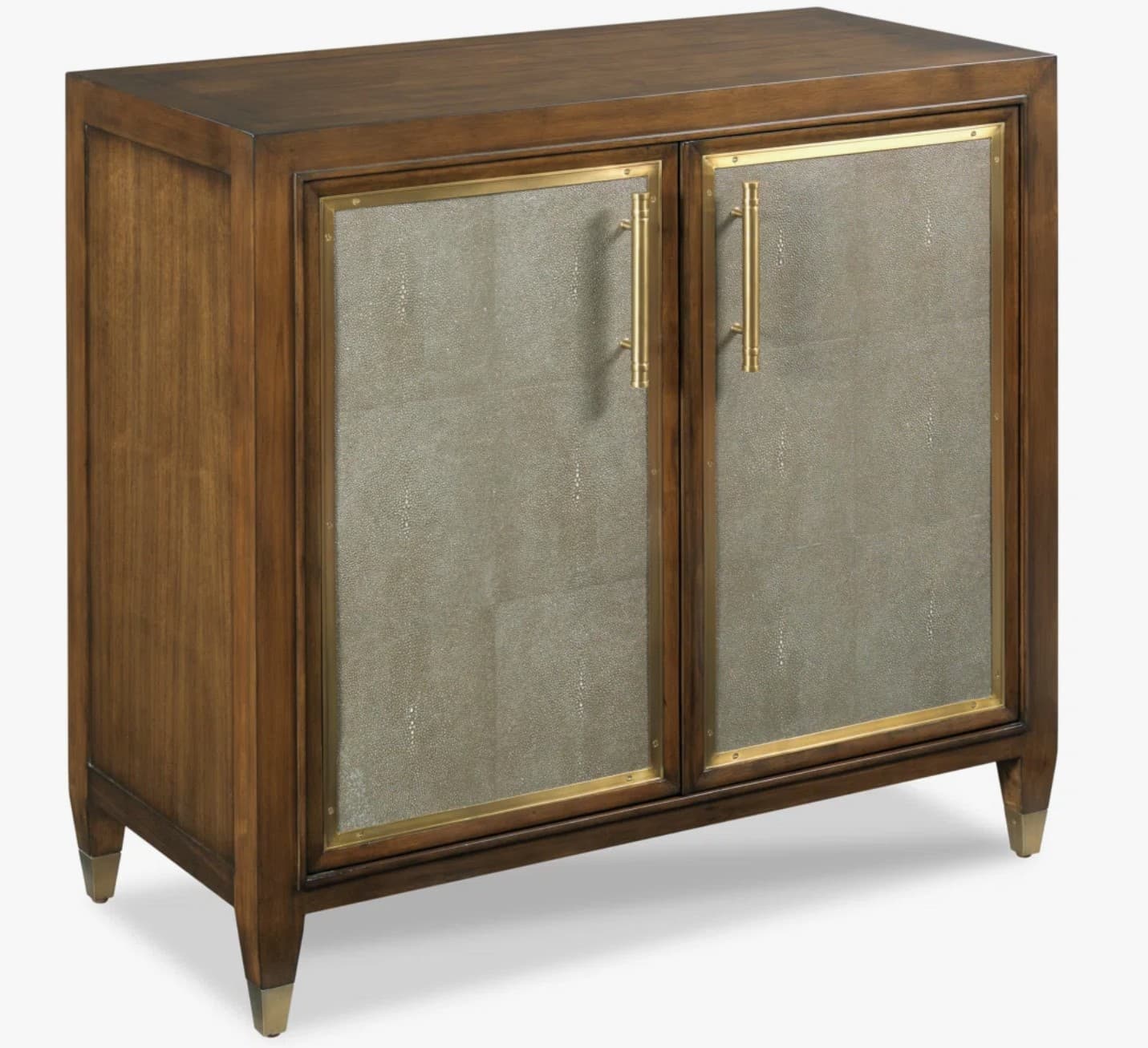 A two-door accent cabinet featuring a dark-stained wooden frame, textured shagreen-like door panels, polished brass trim, and cylindrical brass pull handles. The cabinet stands on tapered legs with brass ferrules. — 3D model