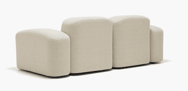 A two-seater sofa with a textured boucle upholstery. The sofa features rounded arms and a low profile with distinct seating cushions. — 3D model