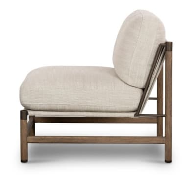 An armless lounge chair featuring a minimalist design with a visible wooden frame and light-colored upholstered cushions. The seat and back cushions are thick and appear to be covered in a textured, light beige fabric. The frame consists of solid wood legs and crossbars in a medium-brown finish, with dark metal brackets securing the parts and supporting the sling-style seat base. The backrest is angled for comfort, and the overall aesthetic is clean and modern. — 3D model
