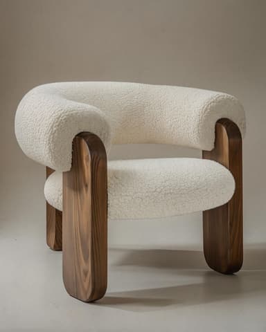 A modern lounge chair featuring a plush, U-shaped white boucle upholstery supported by a dark, rounded wooden frame and legs. The design is contemporary and inviting. — 3D model