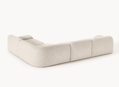 A modular sectional sofa with rounded edges and a plush, textured upholstery. The design features deep seating and a low profile, composed of multiple connected modules forming an L-shape. — 3D model