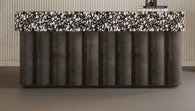 A long, rectangular bench featuring a speckled black and white terrazzo top and a base composed of numerous dark, vertically fluted cylindrical elements. — 3D model