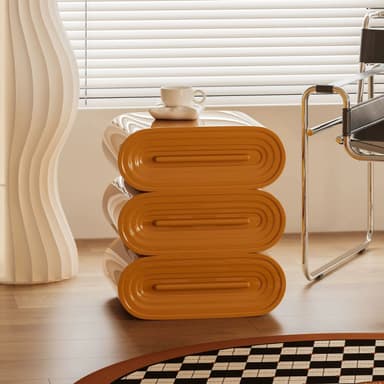 A set of three vertically stacked, modular side table units. Each unit features a distinctive curved, U-shaped profile with highly rounded edges, finished in a glossy amber-orange lacquer. The top surface of each unit is inset with a rectangular panel of light-toned wood veneer, providing a textural and color contrast. The units are designed to be stackable, allowing for flexible arrangements and varying heights. The overall aesthetic is modern and sculptural. — 3D model