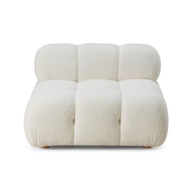 A single-seater, modular lounge chair characterized by its rounded, plush form and tufted upholstery. It is covered in a textured, off-white boucle fabric and features a low profile with small, visible wooden feet. — 3D model