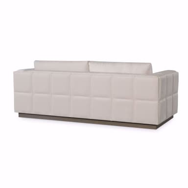 A light-colored sofa with a low profile base. The sofa features two seat cushions and two back cushions, with straight arms. The right arm has a segmented, padded design. — 3D model