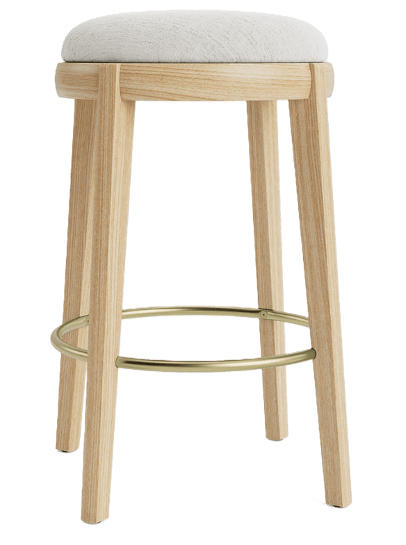 A modern bar stool featuring a round, padded, and upholstered seat in an off-white fabric, supported by four straight, light-toned wooden legs. A circular brass footrest connects the legs, providing both support and a metallic accent. — 3D model