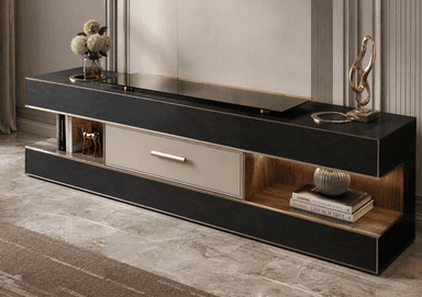 A modern, rectangular media console featuring a black faux marble top and sides, with a central light-colored drawer, two open shelves, and gold-toned metallic accents. A rectangular dark glass panel with circular markings is integrated into the top surface. — 3D model