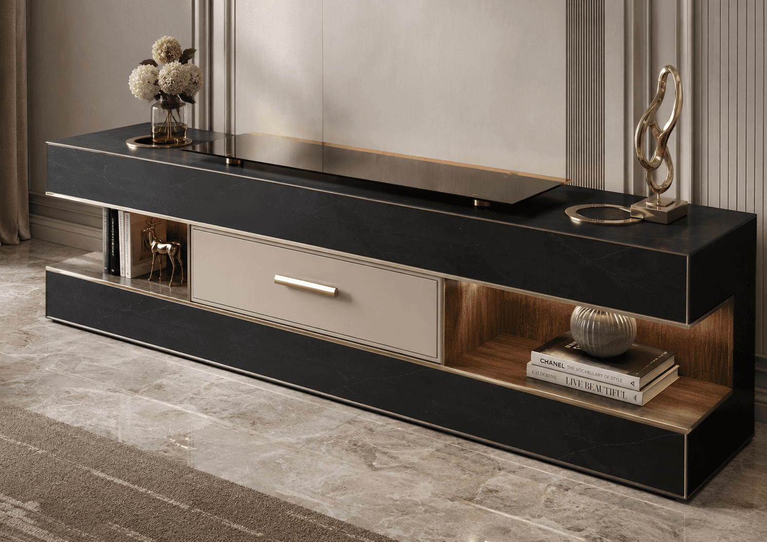 A modern, rectangular media console featuring a black faux marble top and sides, with a central light-colored drawer, two open shelves, and gold-toned metallic accents. A rectangular dark glass panel with circular markings is integrated into the top surface. — 3D model