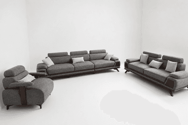 A long, multi-section sofa featuring gray fabric upholstery, adjustable headrests, and integrated dark wood accents on the armrests and base, supported by low-profile wooden legs. It includes several small white accent pillows. — 3D model