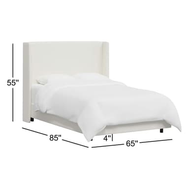 A white upholstered bed frame with a tall, winged headboard. The bed is dressed in white linens, including a duvet and pillows. Dimensions are provided: 55 inches in height for the headboard, 85 inches in length, and 65 inches in width. The frame itself appears to be a platform style with a low profile, indicated by the 4-inch measurement. The legs are black and barely visible. — 3D model