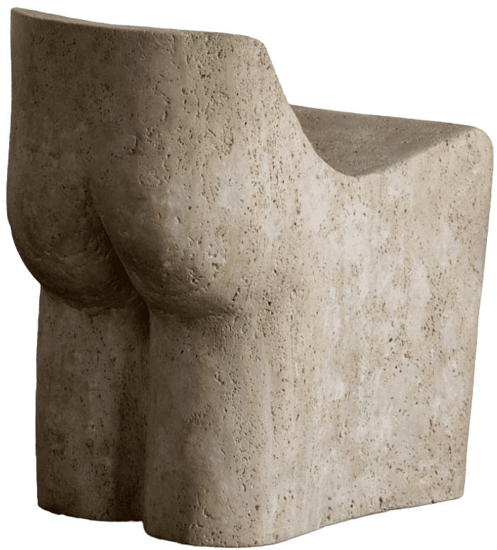 A monolithic accent chair crafted from a single block of natural travertine stone, featuring an organic, sculptural form with a distinctly contoured backrest and seat. The stone exhibits natural porosity and a light beige hue. — 3D model