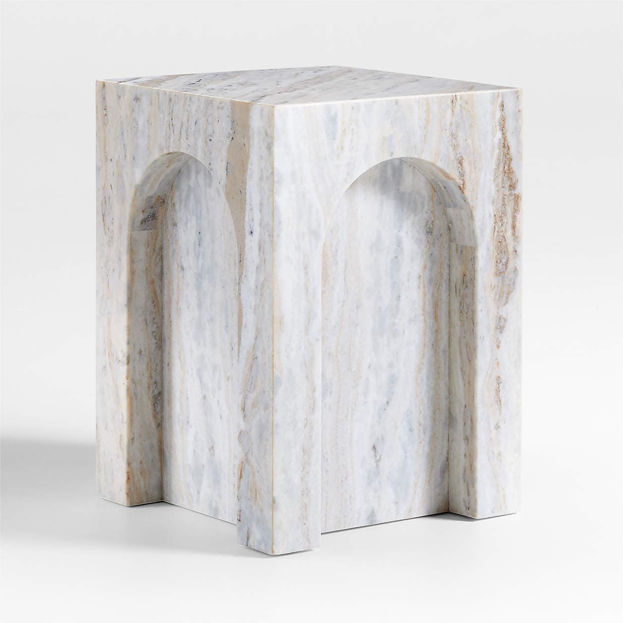 A modern end table crafted from a single block of marble. It features a rectangular top and a base with two arched cutouts on the front face. The marble exhibits veining in shades of white, grey, and tan, giving it a natural, organic appearance. The overall form is minimalist and sculptural. — 3D model