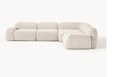 A modular sectional sofa with rounded edges and a plush, textured upholstery. The design features deep seating and a low profile, composed of multiple connected modules forming an L-shape. — 3D model