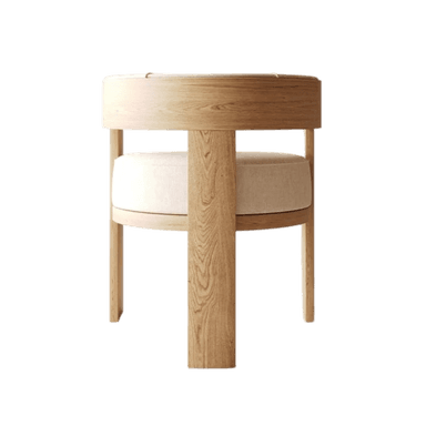 A modern chair featuring a curved, upholstered backrest and seat, supported by a wooden frame. The frame has a minimalist design with thick, angular legs and a central support structure for the seat. The upholstery appears to be a textured, light-colored fabric. — 3D model
