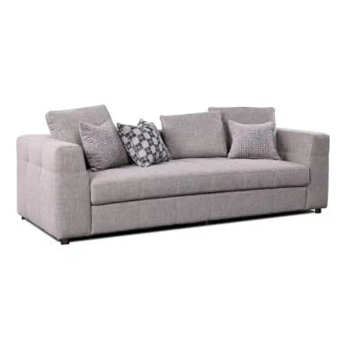 A contemporary three-seater sofa upholstered in a light grey textured fabric, featuring clean lines, track arms with subtle button tufting on the exterior, and generous loose back and seat cushions. It comes with four decorative throw pillows in coordinating grey tones and patterns. — 3D model