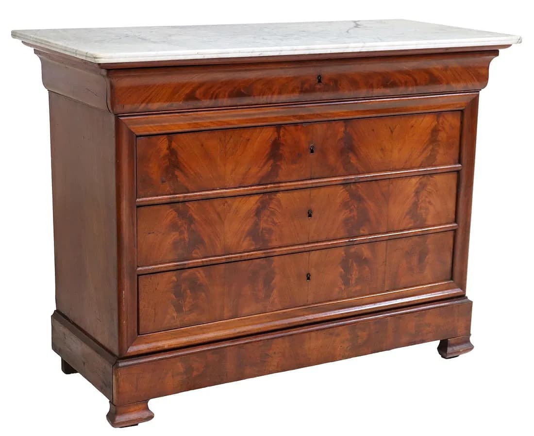 A rectangular chest of drawers featuring a white marble top, a shallow frieze drawer, and three larger drawers below. Constructed from richly figured wood, likely mahogany or burr wood, with a warm reddish-brown finish. The piece rests on a plinth base with small bun feet. — 3D model