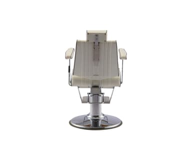 A white barber chair with channel tufting on the seat back and seat. It features chrome accents on the armrests, base, footrest, and hydraulic lift mechanism. The chair includes a headrest and a flip-up footrest. There is a logo on the side of the seat that reads 'BELMONT'. — 3D model