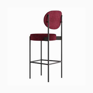 A modern bar stool with a minimalist design. It features a slender metal frame supporting a circular seat and an oval backrest, both upholstered in a textured, deep red fabric. The frame has a dark, matte finish, and the legs are connected by horizontal supports for stability. — 3D model