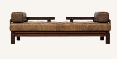 A mid-century style daybed featuring a dark-stained exposed wooden frame and a tufted brown leather cushion, complemented by two cylindrical bolster pillows at each end. — 3D model