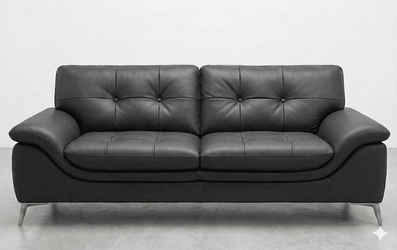 A modern two-seater sofa upholstered in dark gray leather. The sofa features a tufted design on the back cushions and seat cushions, with buttons accentuating the tufts. It has curved armrests and rests on four sleek, silver-toned metal legs. — 3D model