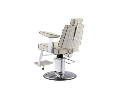 A white barber chair with channel tufting on the seat back and seat. It features chrome accents on the armrests, base, footrest, and hydraulic lift mechanism. The chair includes a headrest and a flip-up footrest. There is a logo on the side of the seat that reads 'BELMONT'. — 3D model