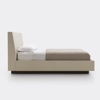 A modern upholstered platform bed with a padded headboard and a floating-effect base. — 3D model
