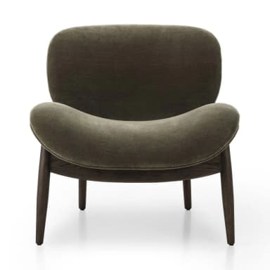 A contemporary armchair with a distinctive organic shape, featuring a high, enveloping backrest and a curved, molded seat and armrest. The chair is supported by a wooden base with four splayed legs. — 3D model