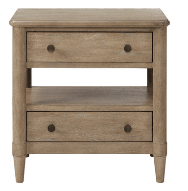 A wooden nightstand with two drawers and an open shelf. The top surface is flat with slightly rounded edges. Each drawer has a single, round, dark-colored pull. The legs are tapered and have decorative banding near the top. The wood grain is visible, suggesting a natural wood construction with a light brown, distressed finish. — 3D model