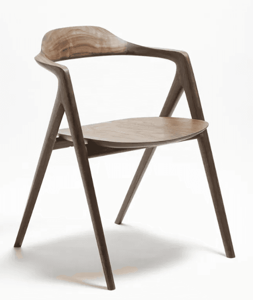 A modern wooden chair with a curved backrest and seat. The chair features a four-legged base with tapered legs and integrated armrests that flow seamlessly into the backrest. The design emphasizes organic curves and a minimalist aesthetic. — 3D model