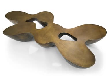 A low-profile, sculptural coffee table with an organic, undulating form and a patinated bronze finish. It features integrated depressions on its surface. — 3D model