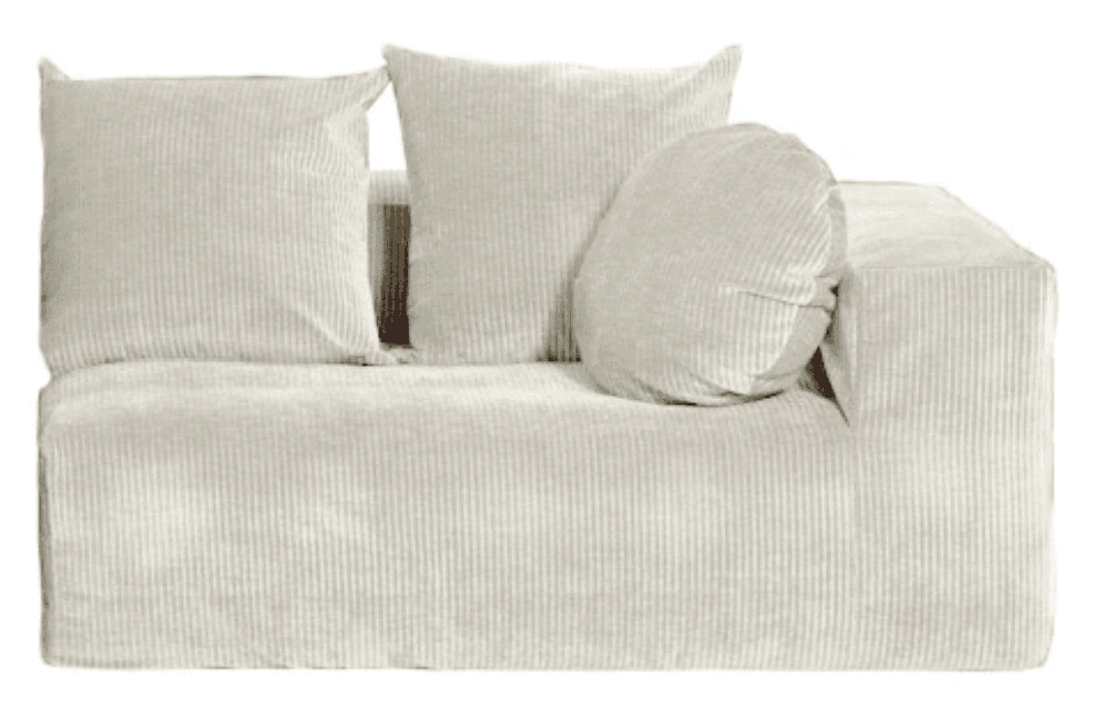 A light-colored, low-profile sofa with a modular design. It features a textured corduroy-like upholstery. The sofa includes two square throw pillows and one round bolster pillow. The armrest on the right side is integrated into the main body of the sofa, creating a continuous surface. — 3D model