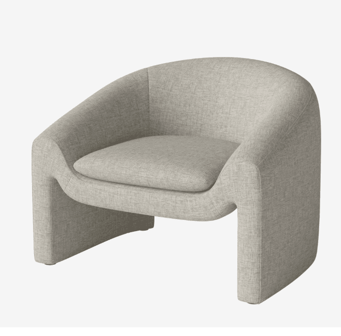 A contemporary armchair with a distinctive curved silhouette. The armchair features a fully upholstered body with integrated armrests that flow seamlessly into the base. It has a substantial, block-like form with a recessed seat cushion and a rounded backrest. The legs are integrated into the structure, forming a continuous base. — 3D model