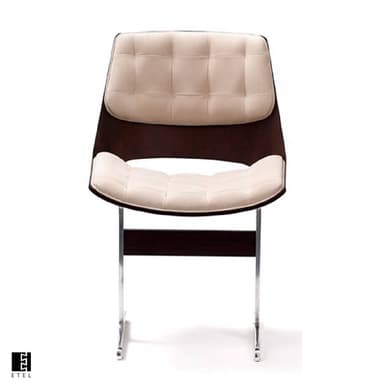 A modern armchair with a sculpted, dark wood shell back and seat, supported by a polished chrome base. The seat features a light-colored, tufted upholstered cushion. — 3D model