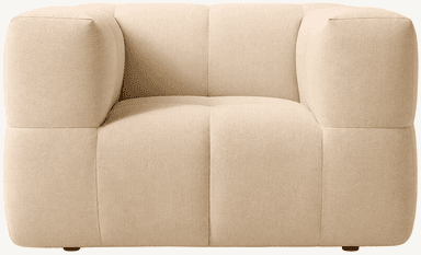 A contemporary, single-seater armchair featuring a distinct block-style silhouette, upholstered in a light beige textured fabric, designed for modern interiors. — 3D model