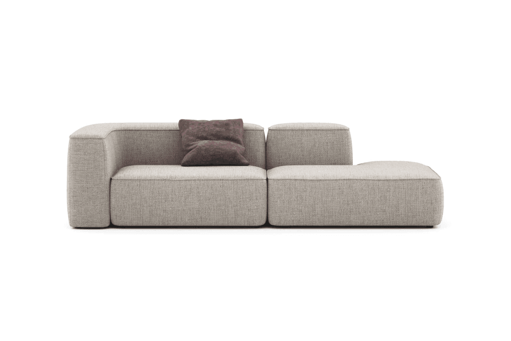 A contemporary modular sectional sofa upholstered in a light beige fabric, featuring a low profile, rounded edges, and a right-hand chaise lounge component. A single small, dark plum-colored throw pillow rests on the left armless section. — 3D model