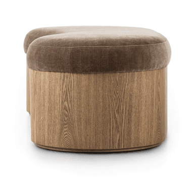 An oval-shaped ottoman with a plush velvet-like upholstered top and a wooden base. The base features vertical wood grain patterns, suggesting a veneered or solid wood construction with a natural wood finish. The transition between the upholstered top and the wooden base is seamless. — 3D model