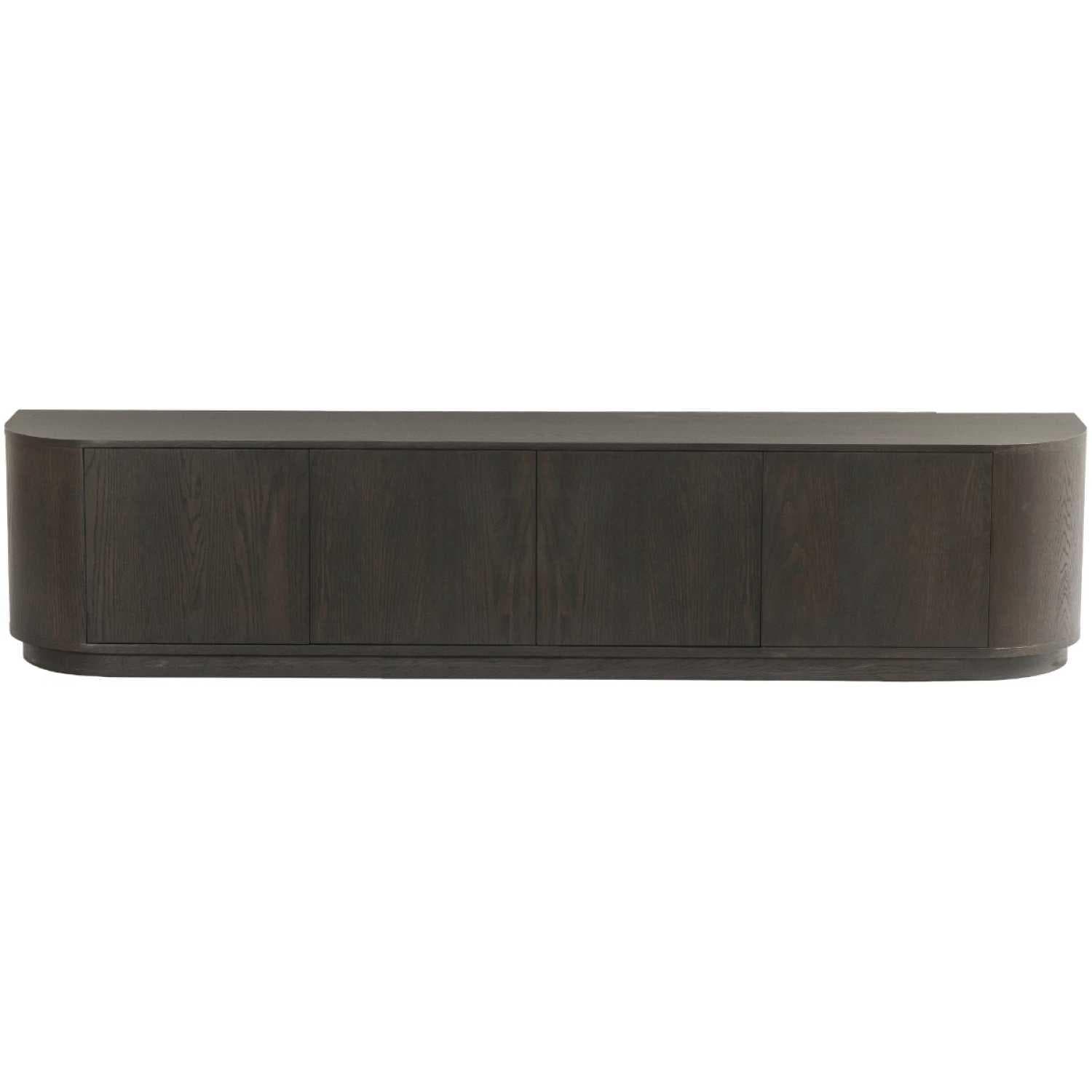 A modern credenza with a dark wood finish and a curved front. It features four cabinet doors arranged horizontally across the front, with a continuous top surface. The design emphasizes clean lines and a minimalist aesthetic, with the rounded edges providing a softer visual appeal. — 3D model