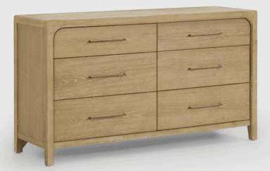 A rectangular six-drawer dresser made from light-toned oak wood with prominent grain. It features softly rounded vertical corners on the frame, and minimalist dark metal bar pulls on each drawer. The dresser stands on short, integrated legs. — 3D model