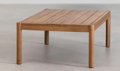 A rectangular coffee table constructed from wood. It features a flat top with a slight inward curve along the longer edges and four straight, cylindrical legs that extend from the corners of the base frame. The wood grain is visible, suggesting a natural finish. — 3D model