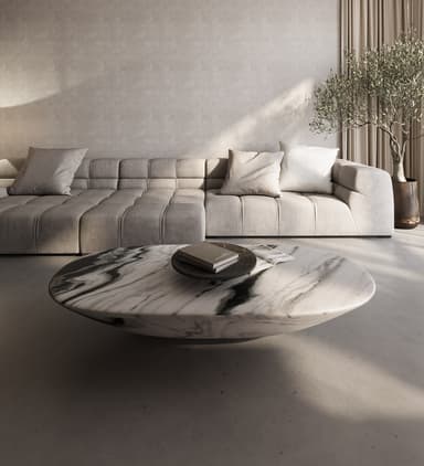 A low-profile, oval-shaped coffee table featuring a top made of white marble with prominent black veining, supported by a simple, dark-colored cylindrical pedestal base. — 3D model